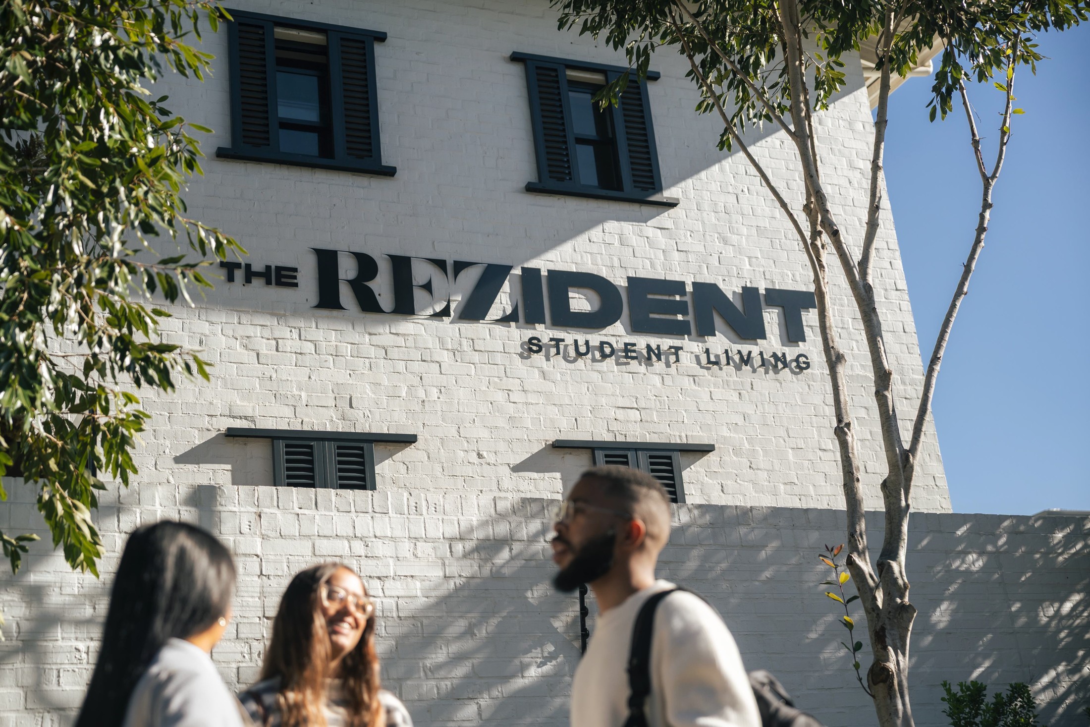 Students outside the ReZident Lovers Walk entrance.