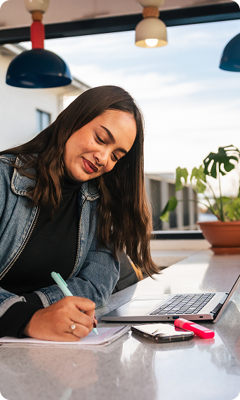 Student studying at a table