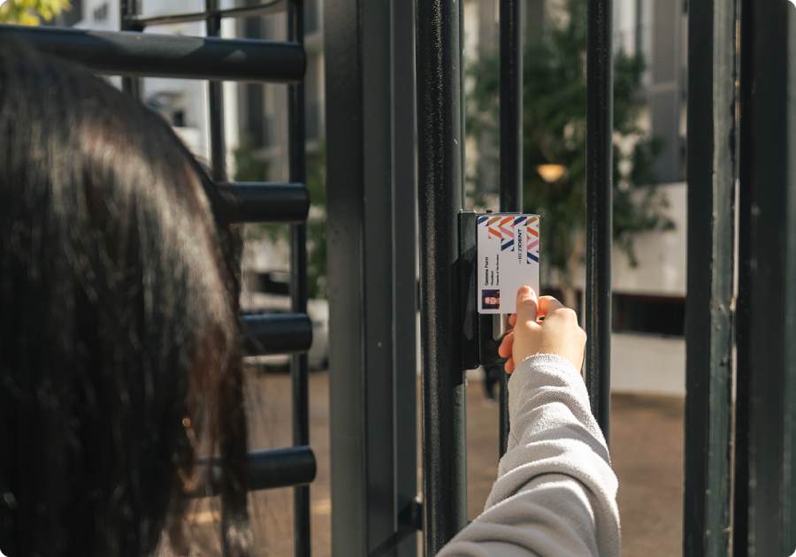 A resident using the secure access reader