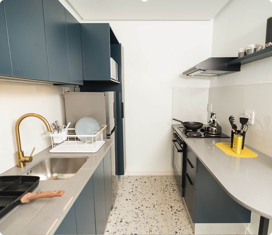 Shared 2-/3-bedroom unit kitchenette at Lovers Walk.