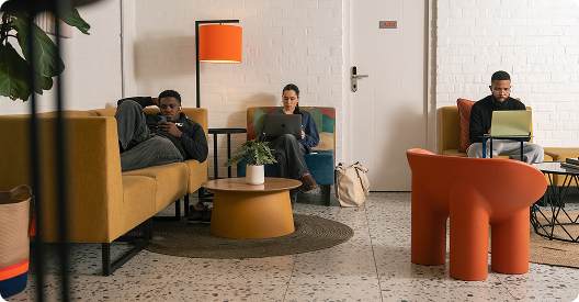 Residents working in the shared lounge
